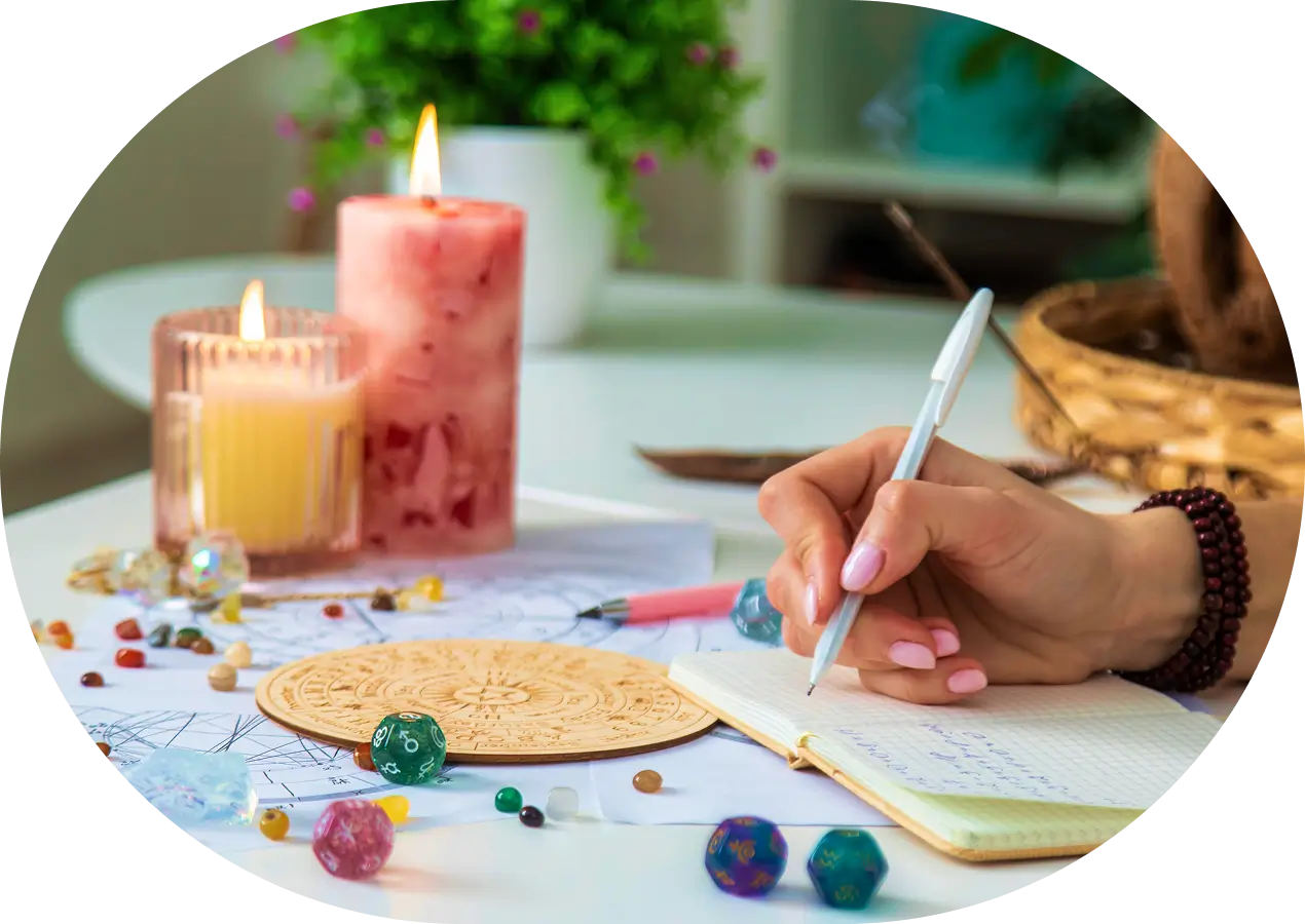Desk with notebooks, candles, and dice