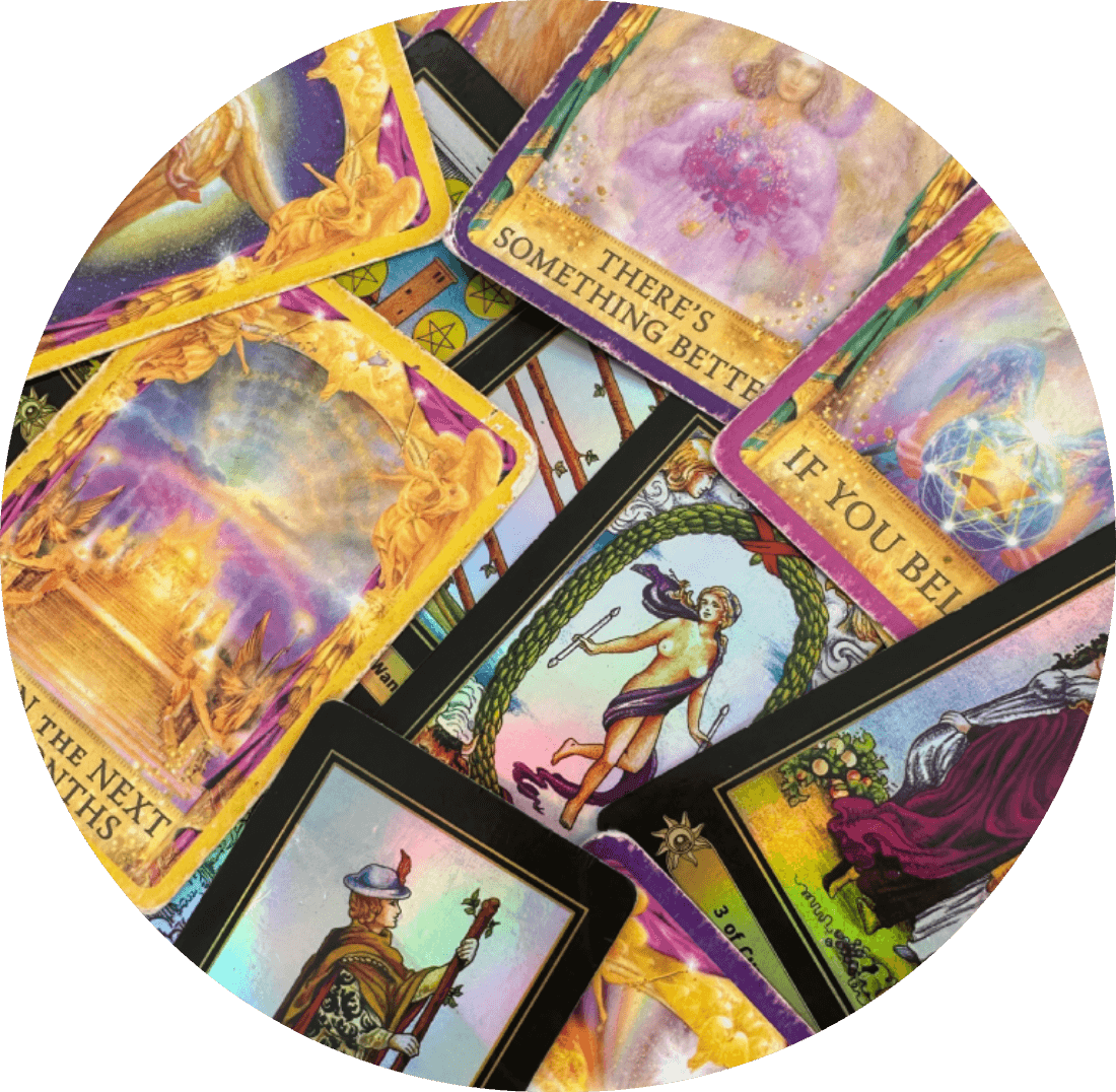 A colorful tarot card spread with vibrant illustrations and mystical themes.